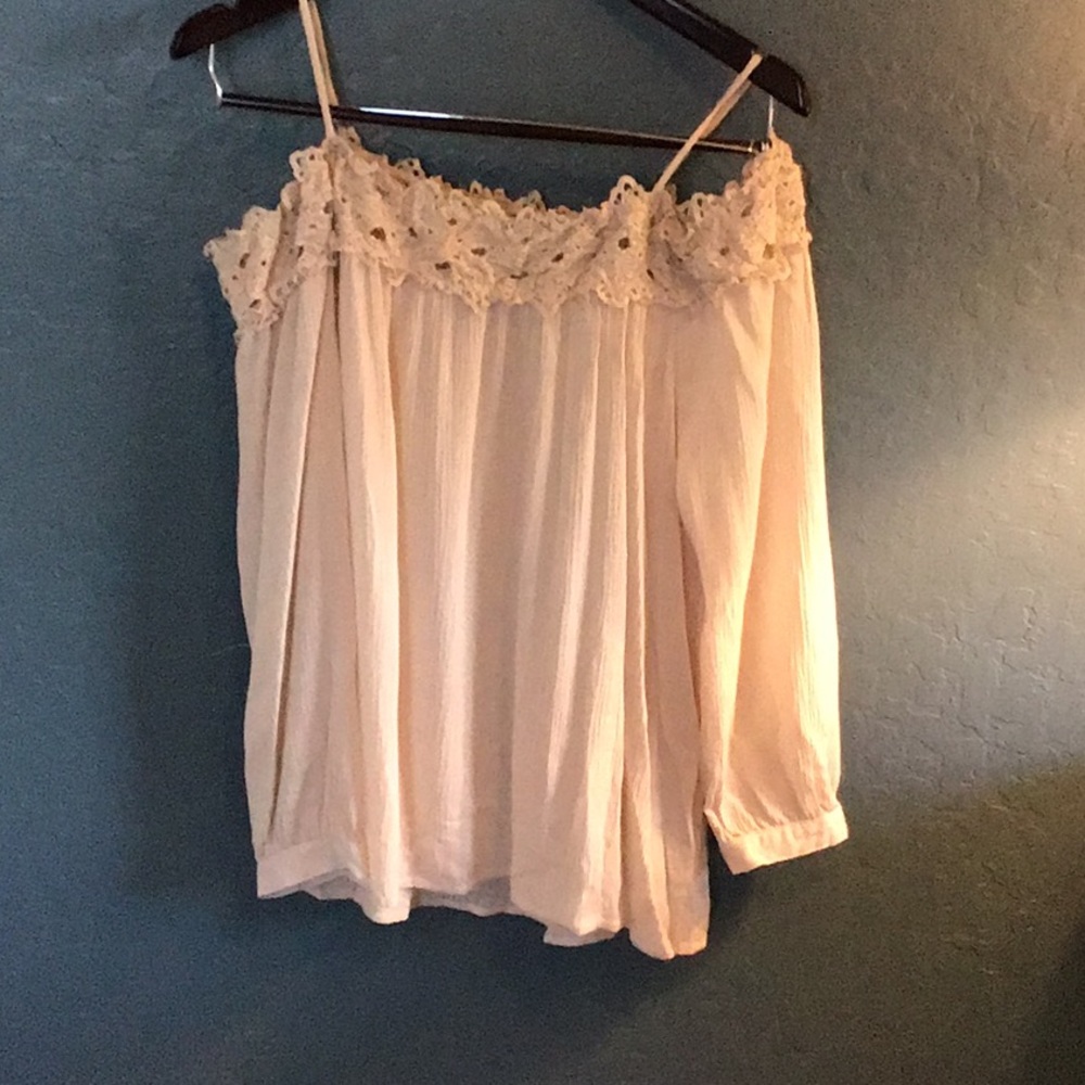Off the shoulder women’s shirt.